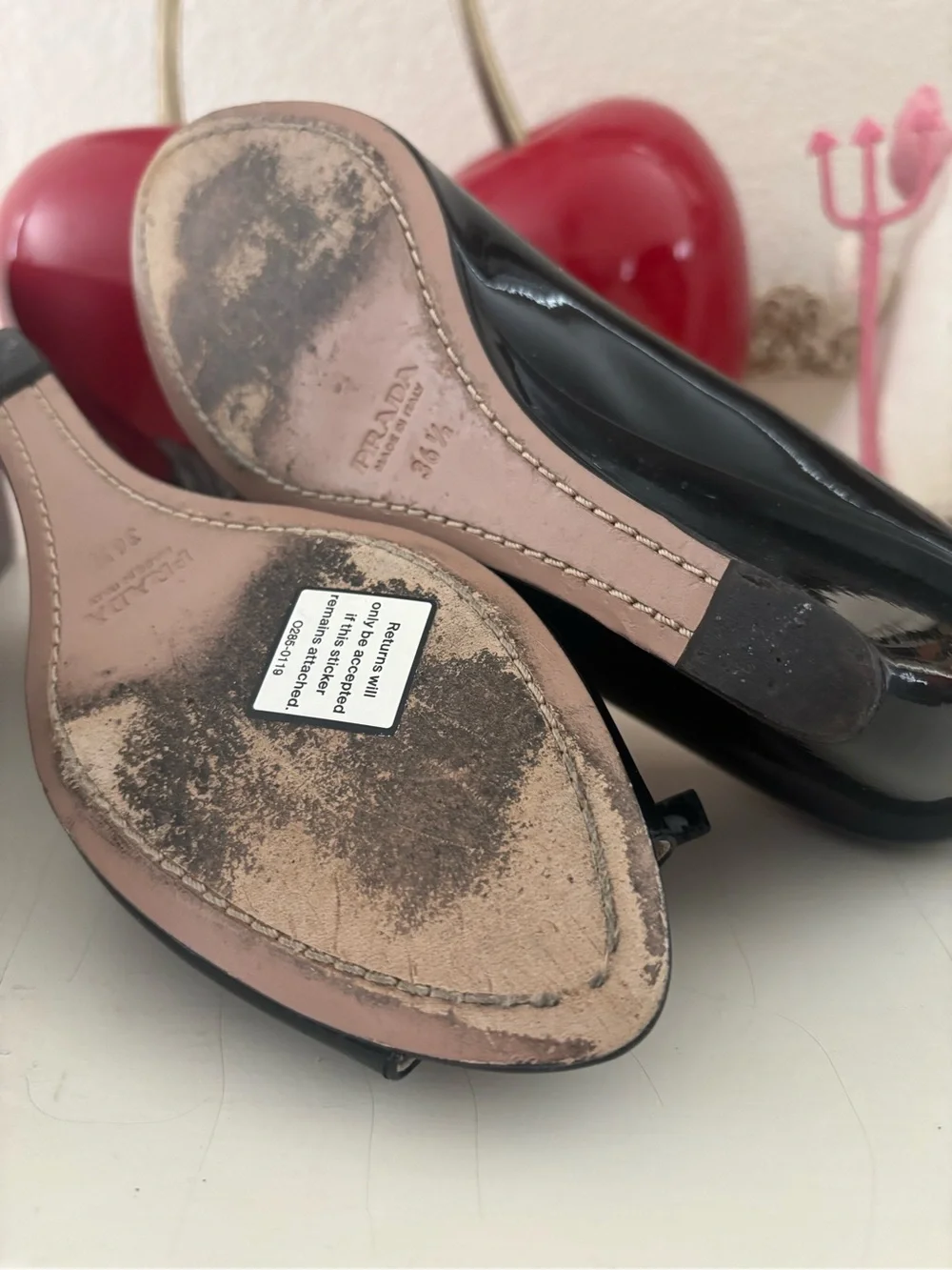 Prada Black Patent Leather Peep-Toe Wedges with Bow and Gold Accent